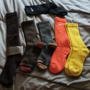 2 pair of timberland 3 pair Nike and one pair of crown vintage socks